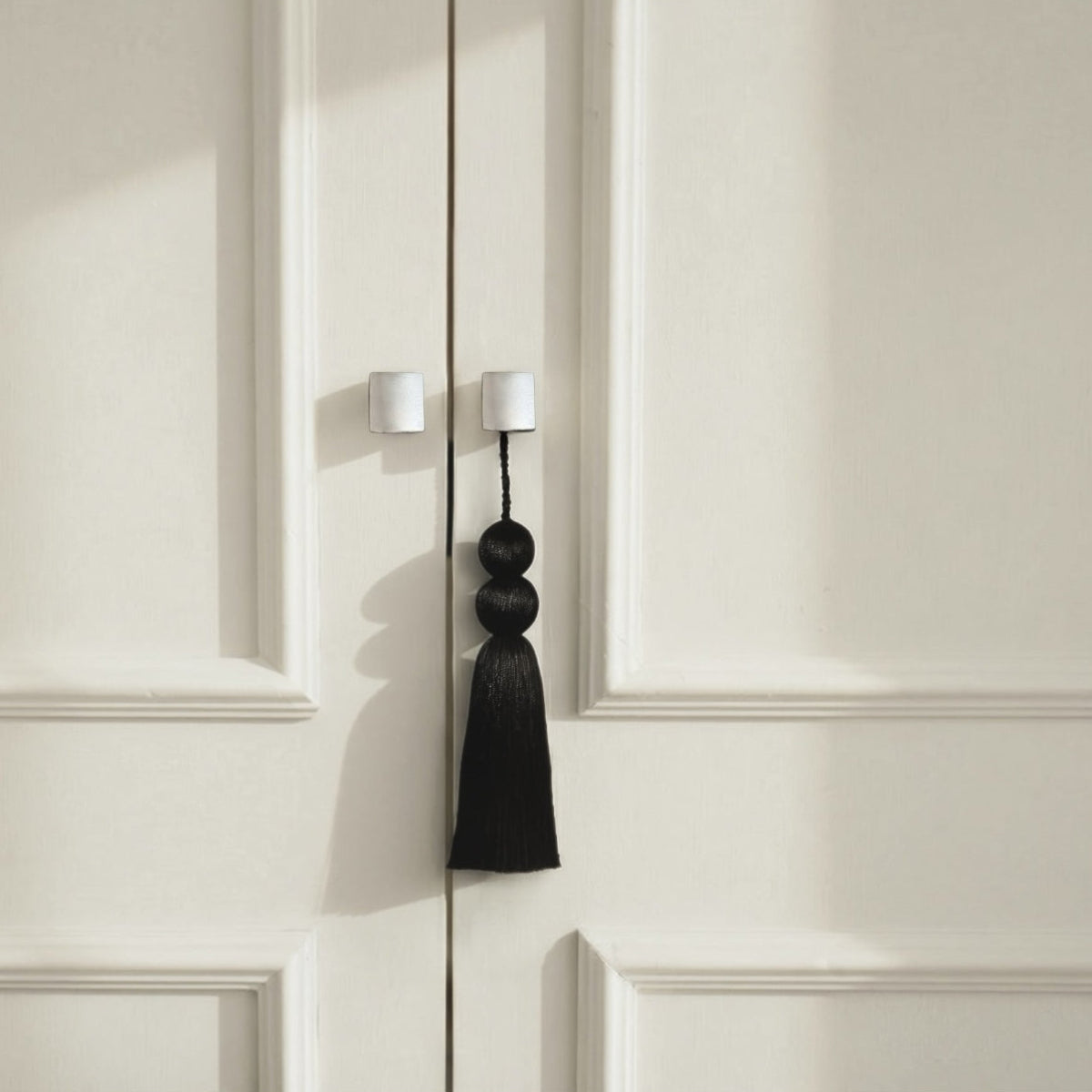 Coline decorative tassel keychain and bag charm with sculptural silhouette and fluid movement, modern luxury accessory