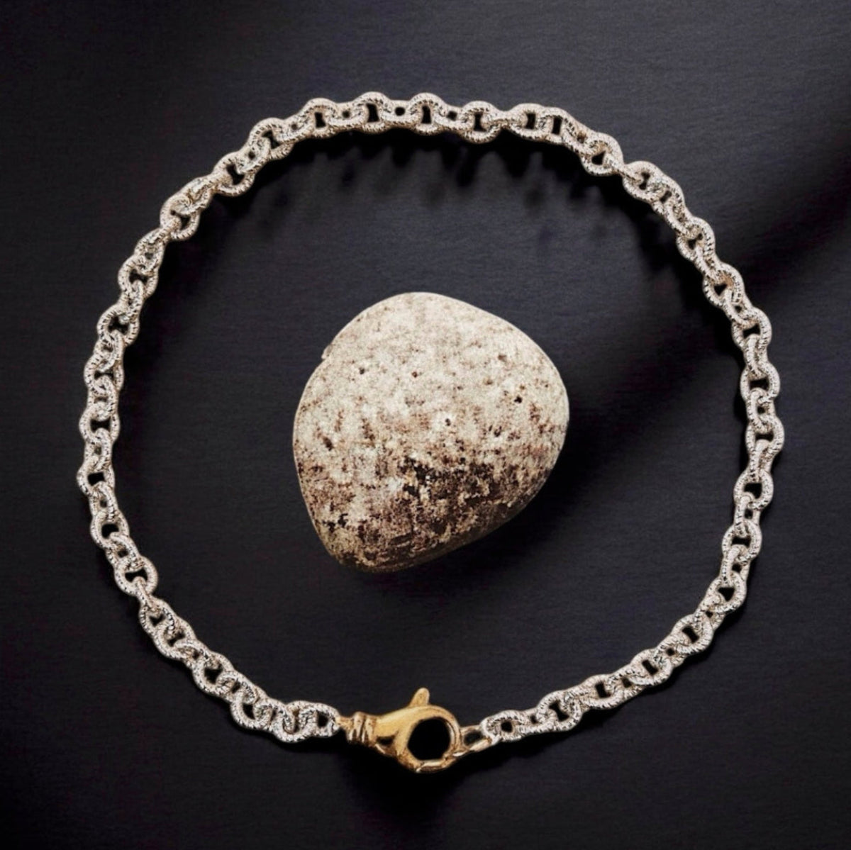 Duet Sterling silver collar necklace with a chunky rope chain and oversized gold-plated lobster clasp. Sculptural luxury chain necklace.