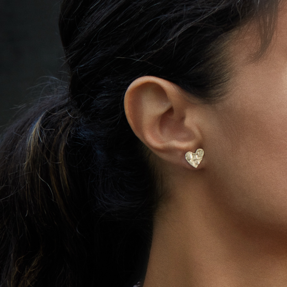 Fragment Heart stud earrings in 14K gold. Sculptural handcrafted luxury heart earrings.