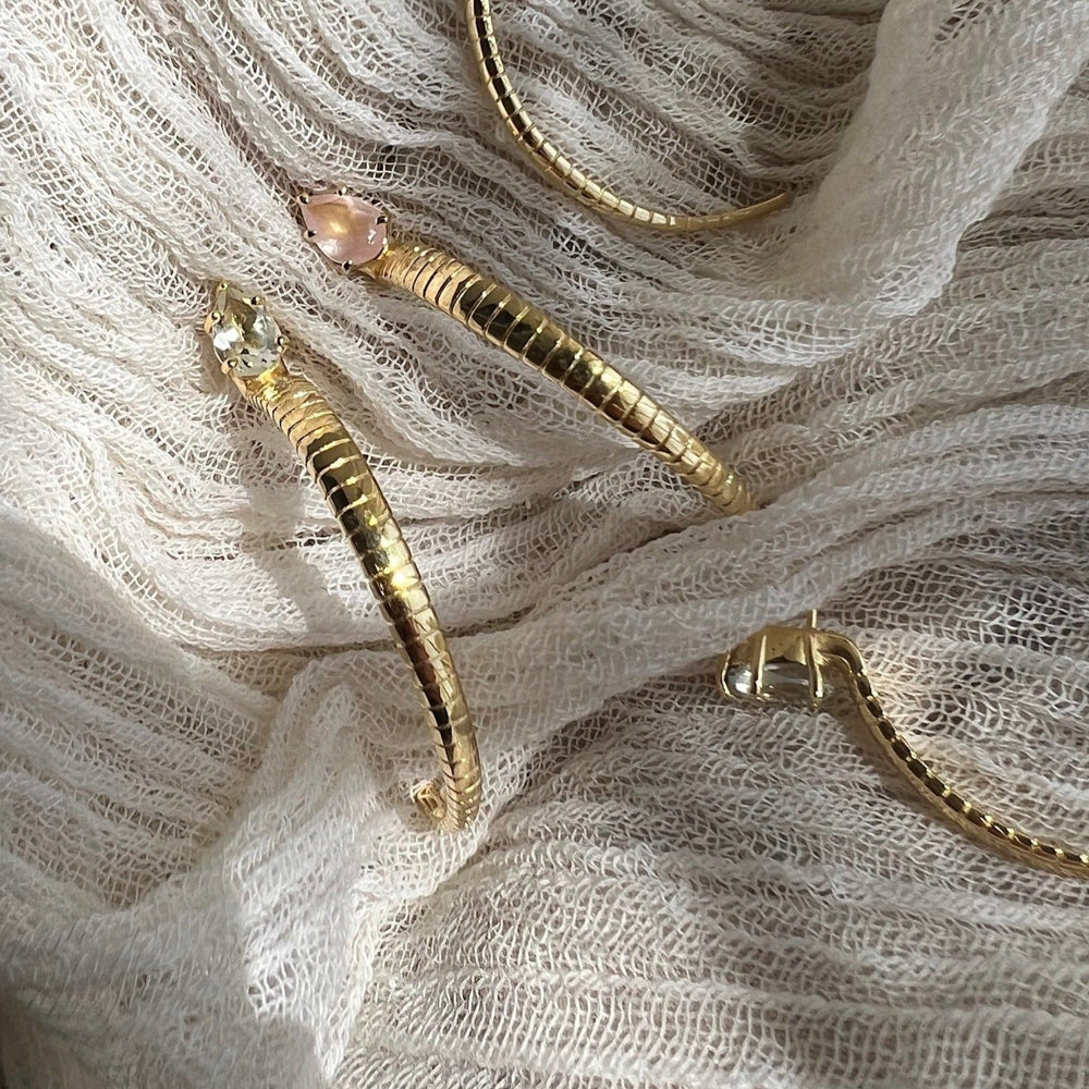 
                  
                    Serpent hoop earrings
                  
                