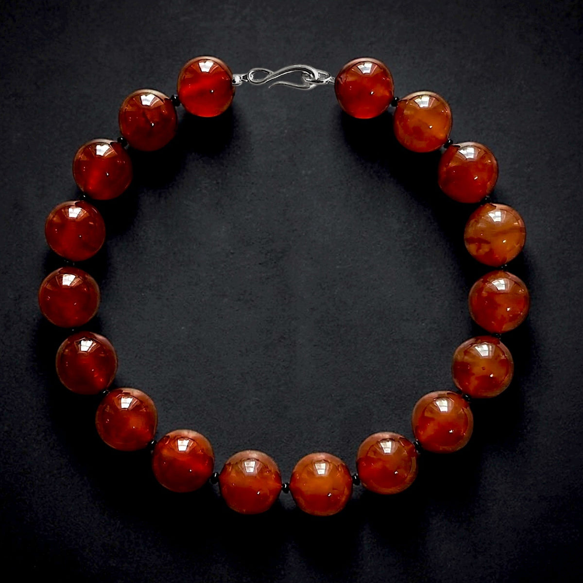 Hera carnelian collar necklace with large polished carnelian beads luxury statement necklace in sterling silver clasp