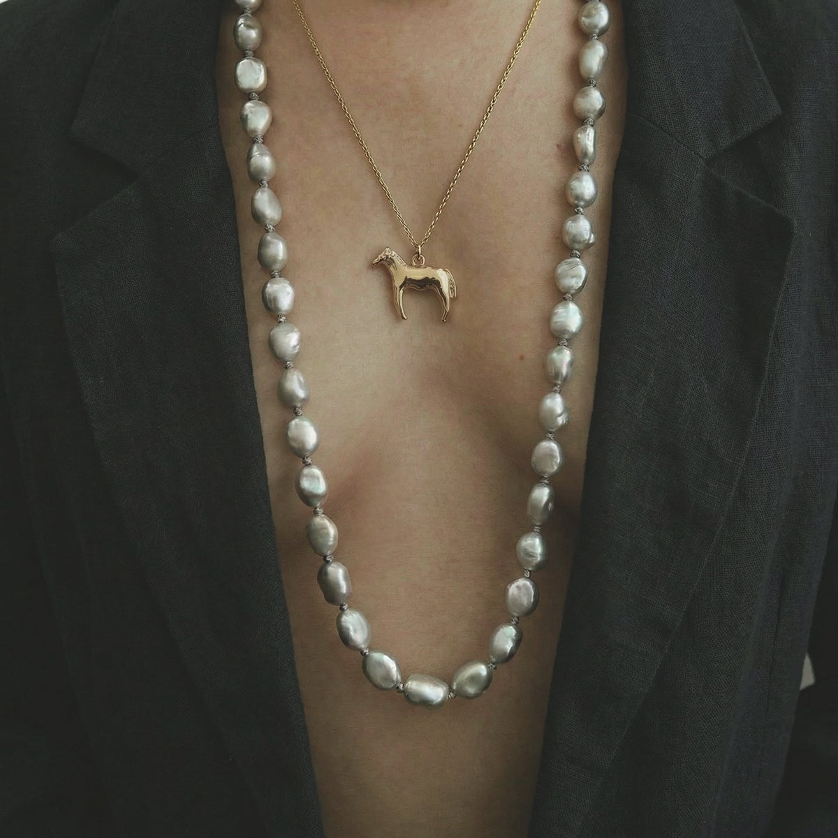 Jacqueline Rose bronze horse pendant necklace, sculptural chiseled horse silhouette inspired by the Year of the Fire Horse