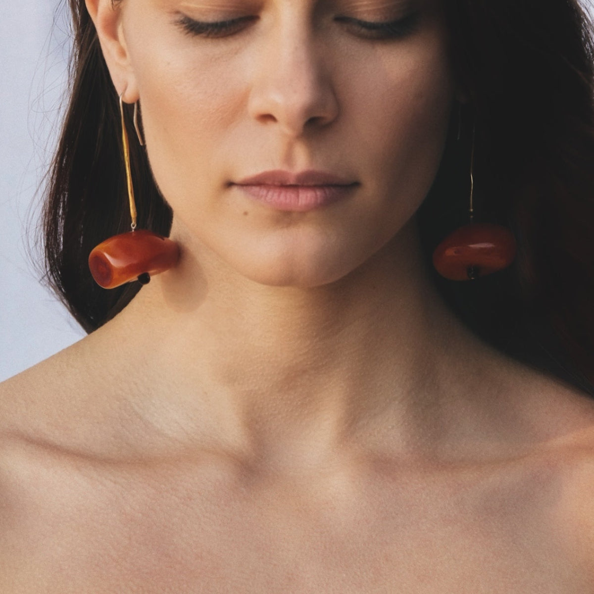 Limited edition vintage amber drop earrings with smoky quartz accents, handcrafted in bronze with Sterling silver hooks. One-of-a-kind sculptural luxury gemstone earrings.