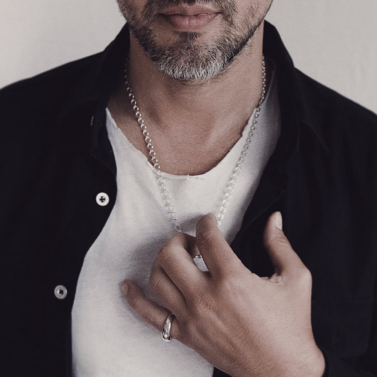 Luxury men's Sterling silver ladder chain necklace with structured links and modern architectural design.