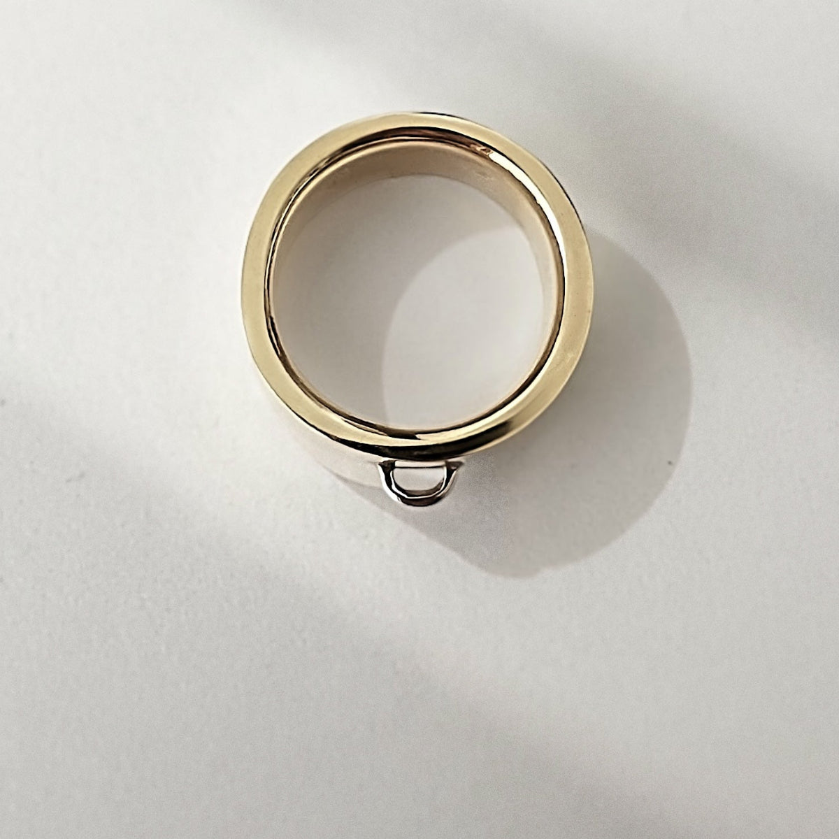 Luxury men's Loop Ring in two-tone bronze and Sterling silver with a clean, minimalist design.