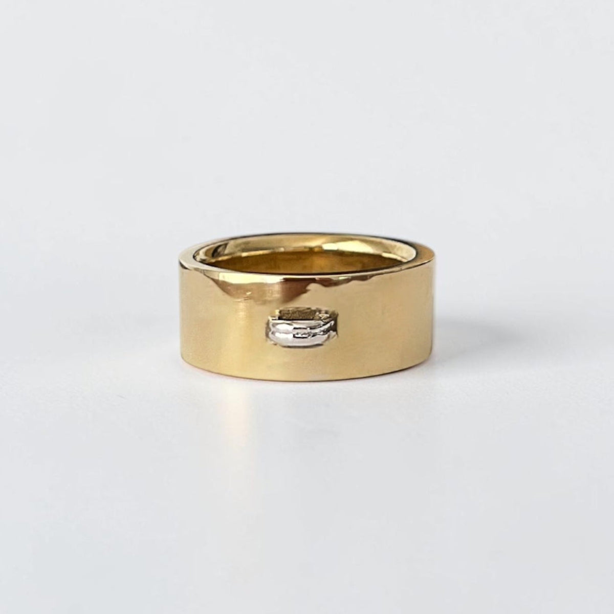 Luxury men's Loop Ring crafted in two-tone bronze and Sterling silver with a clean, minimalist design.