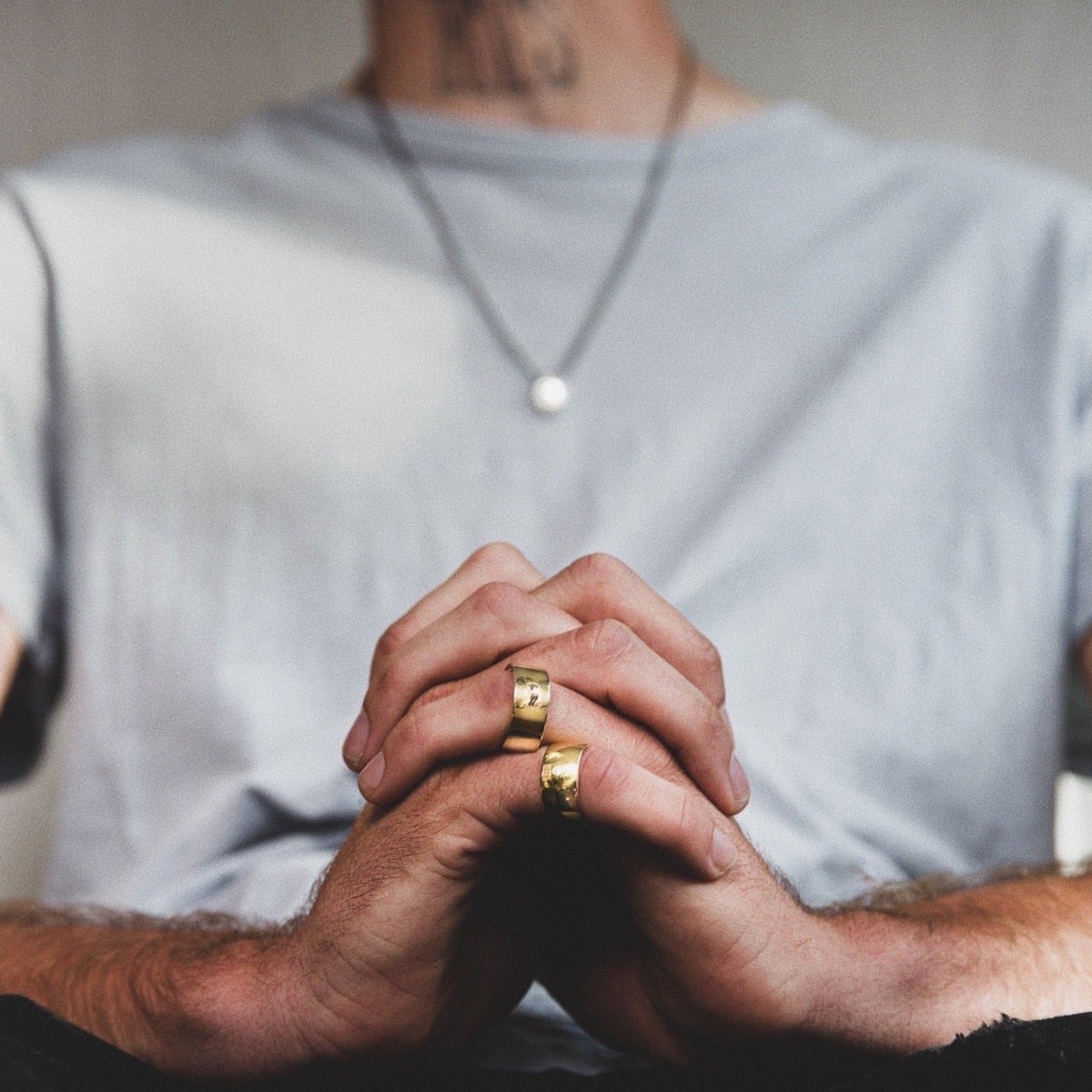 Luxury men's Loop Ring in two-tone bronze and Sterling silver with a clean, minimalist silhouette.
