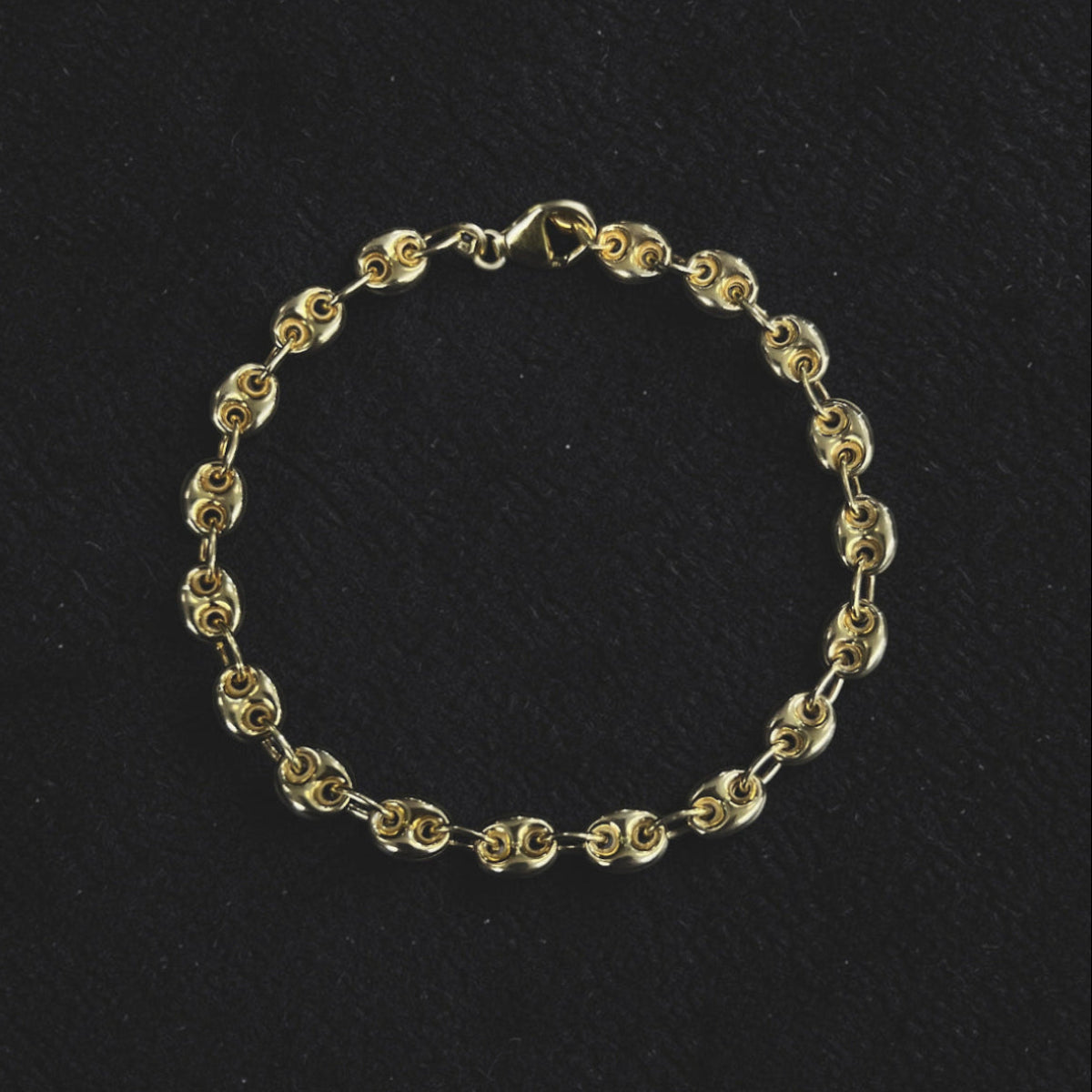 Luxury men's gold vermeil Loop Bracelet with sculptural puffy oval links and a modern minimalist design.