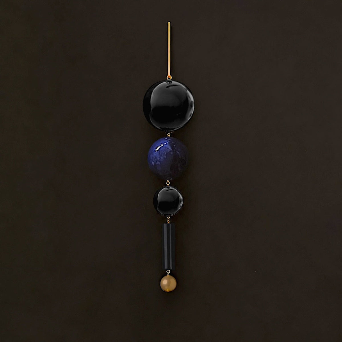 Sculptural lapis lazuli and onyx drop earrings with golden South Sea pearl accent and handcrafted gold-filled wire.