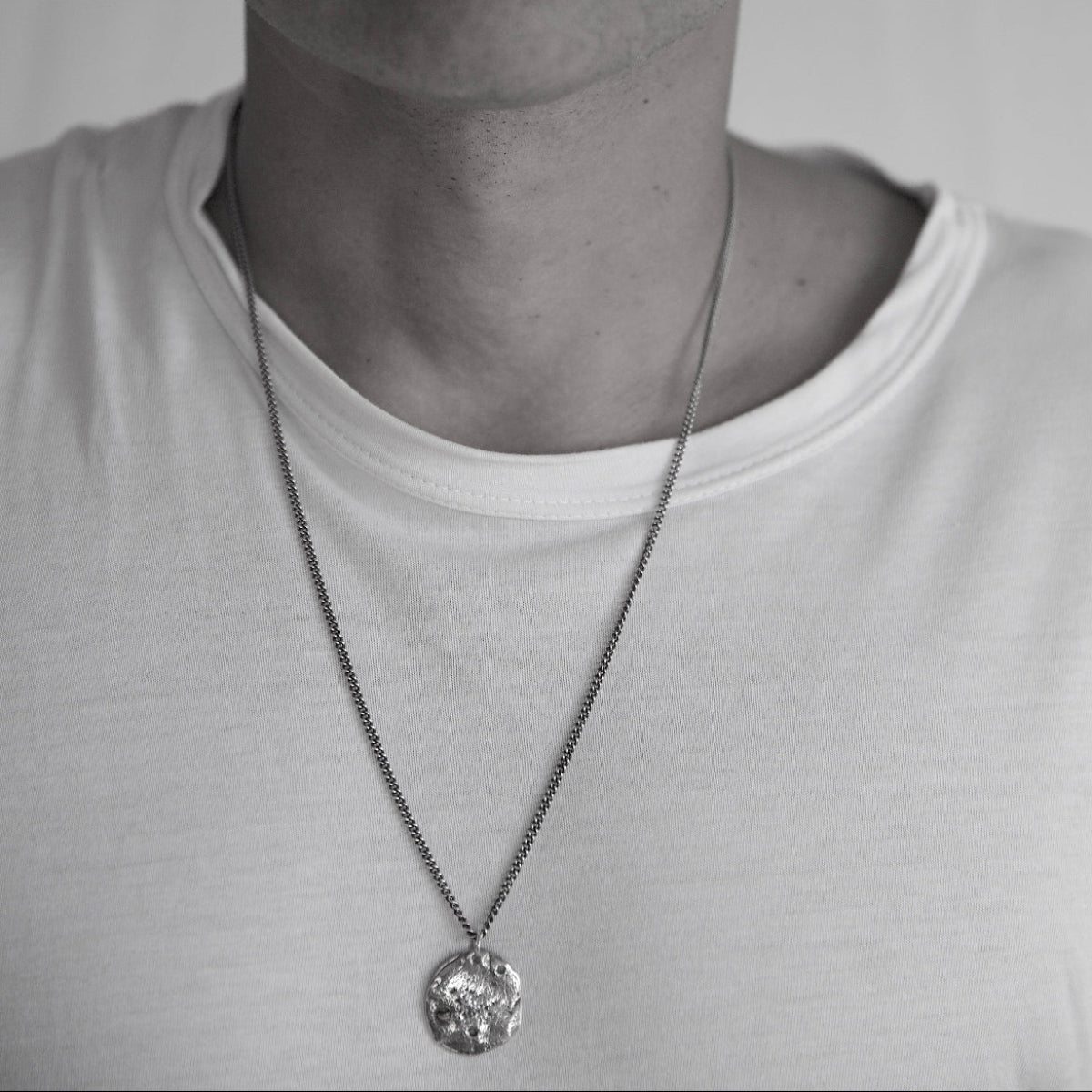 Sterling silver Relic Coin Men's pendant with bezel-set Tiger's Eye cabochon on a 24-inch curb chain necklace.