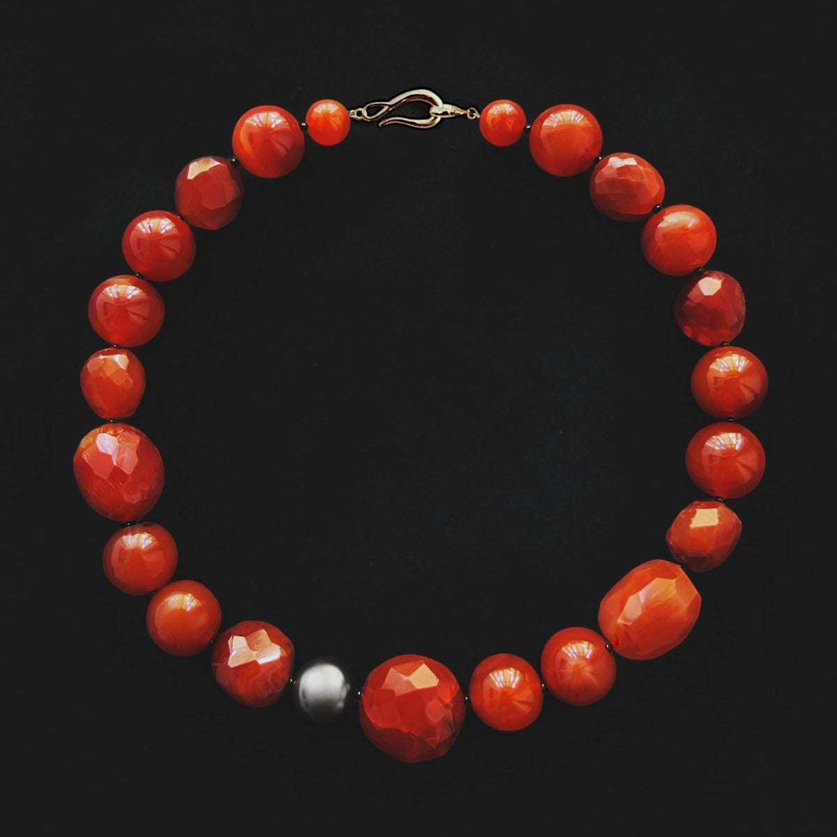 Rhea carnelian and black pearl collar necklace with polished and faceted natural stone beads