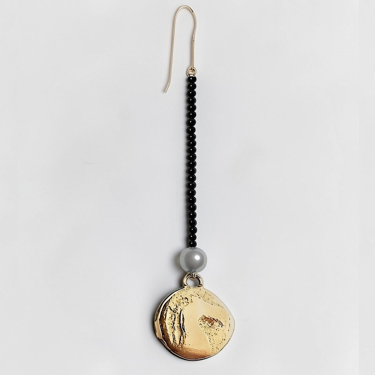 Gold-plated Stallion coin drop earrings featuring polished black glass beads and gold-filled hooks, inspired by the Year of the Fire Horse.