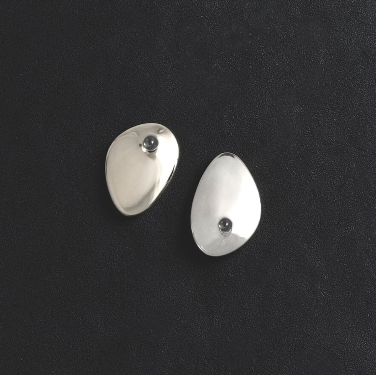 Cirque silver sculptural stud earrings iwith black pearls, modern minimalist statement earrings for everyday wear