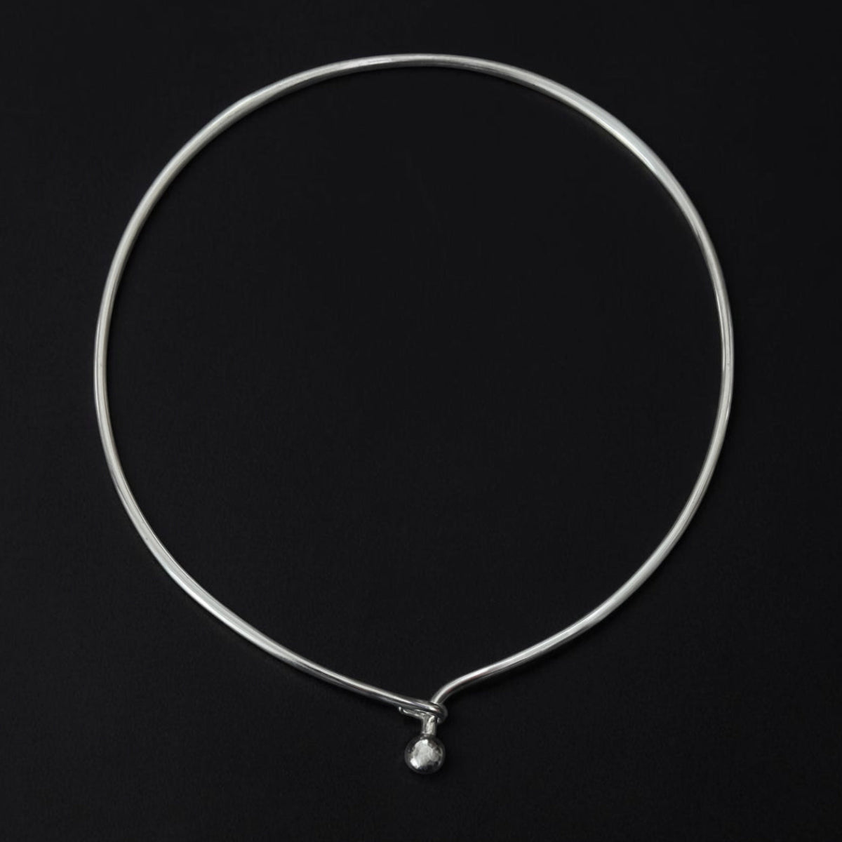 Jacqueline Rose Orb Wire Collar Necklace in sterling silver, minimalist sculptural collar necklace with orb closure, modern luxury jewelry
Very best,
