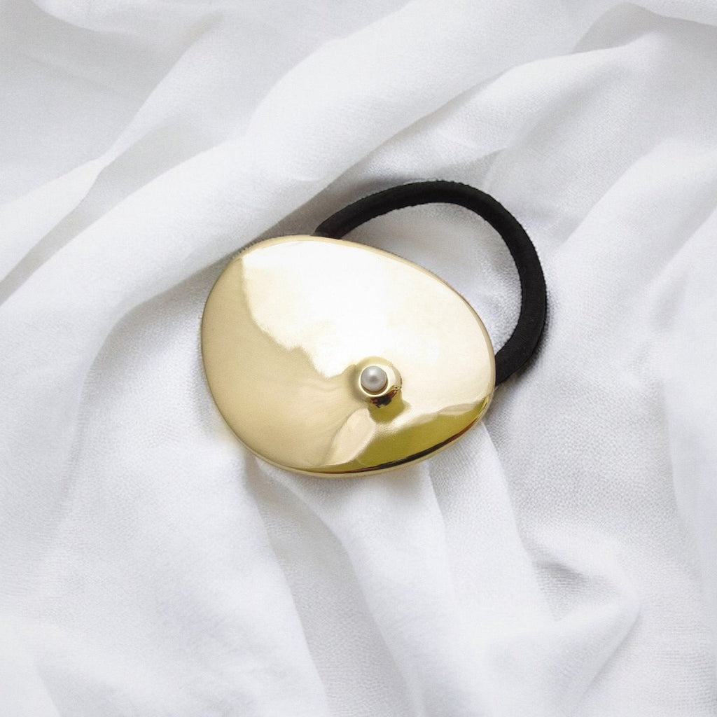 Cirque brass pearl hair tie