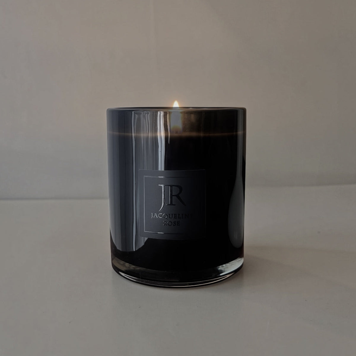 Jacqueline Rose Collection Luxury black glass scented candle hand-poured with soy wax and crackling wood wick