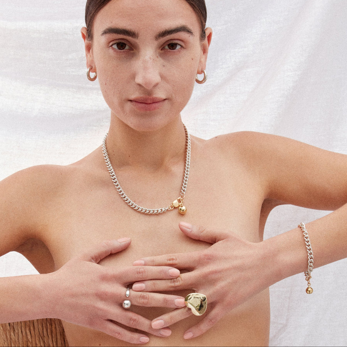 Ball and chain necklace, Big heart ring, Pebble hoop earrings, Fluid ring