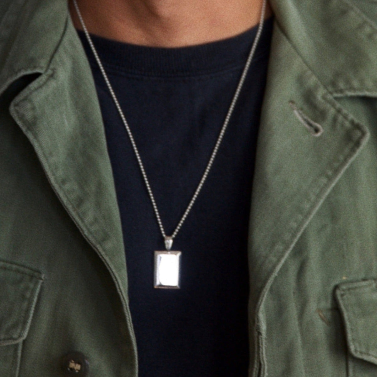 Luxury men's Classic Signet pendant necklace suspended from a ball chain.
